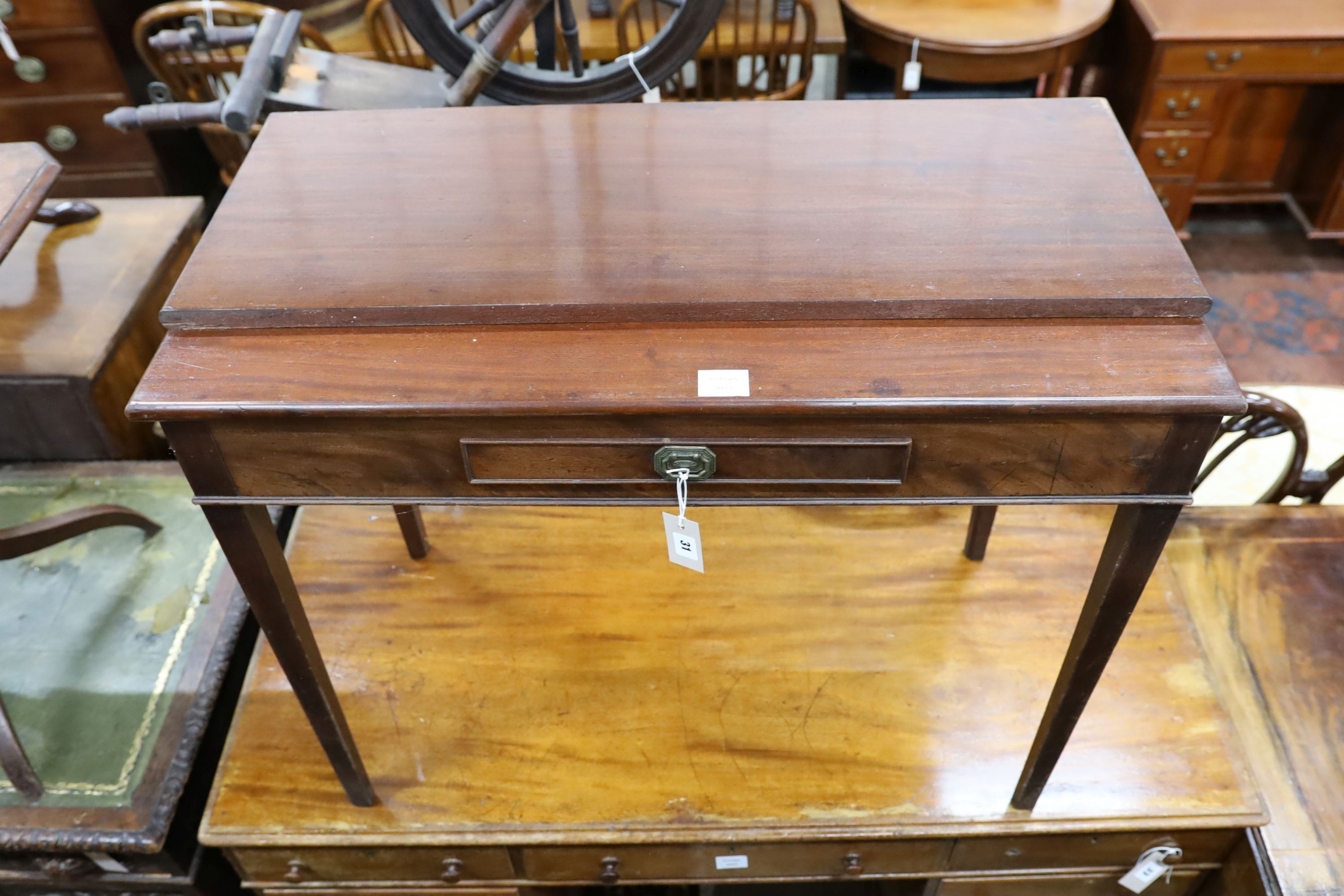 A George III rectangular mahogany folding tea table (altered), width 92cm, depth 46cm, height 74cm